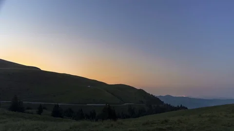 Sunrise mountain view city panorama lights Stock Footage