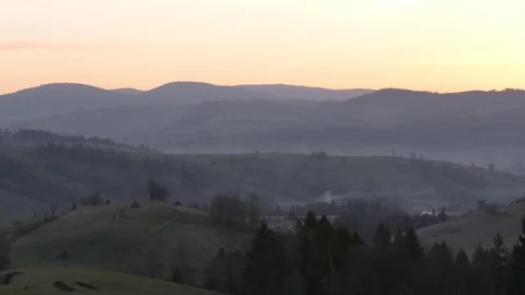Sunrise in the mountains. Horizontal panning. Stock Footage 76868363