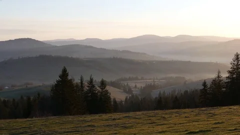 Sunrise in the mountains. Horizontal panning. Stock Footage 76868410