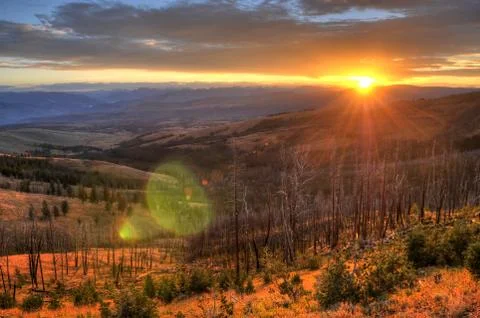 Sunrise in the mountains Stock Photos