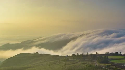 SUNRISE MOVING CLOUDS PAN RIGHT Stock Footage 138328614