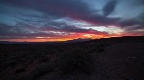 Sunrise in the Nevada desert with clouds movement Stock Footage 40707159