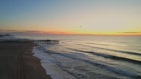 Sunrise ocean by the Pier 4K Stock Footage 241028211