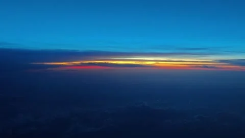 Sunrise or sunset. The view from the window of the plane. Video stock 283394489