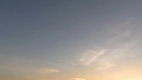 Sunrise orange yellow cloud n bright sun light ray on sunny blue sky Stock Footage 170486181