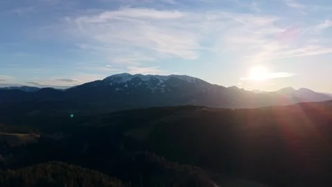 Sunrise over alpine mountain range Stock Footage 329405444