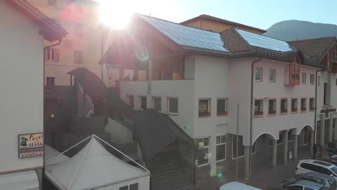 Sunrise over an alpine town Stock Footage 112332530