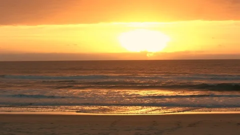 Sunrise over beach 1 Stock Footage 86465025