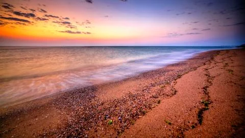 Sunrise over the beach Stock Photos