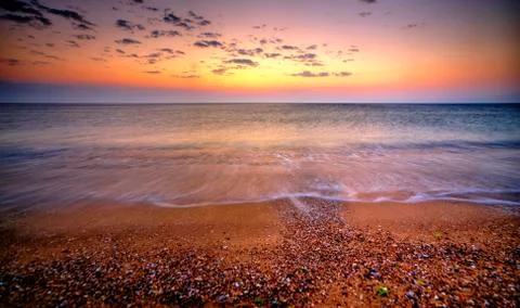Sunrise over the beach Stock Photos