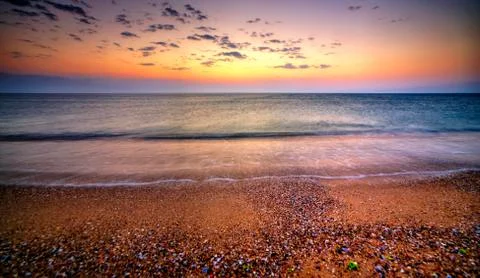 Sunrise over the beach Stock Photos