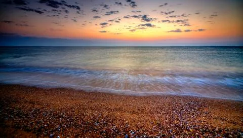 Sunrise over the beach Stock Photos