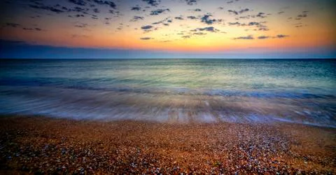 Sunrise over the beach Stock Photos