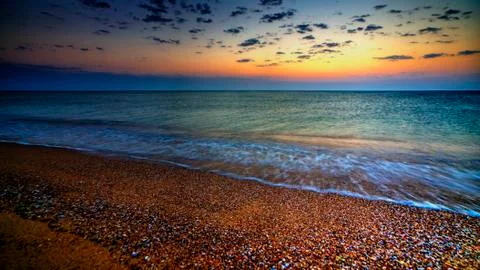 Sunrise over the beach Stock Photos