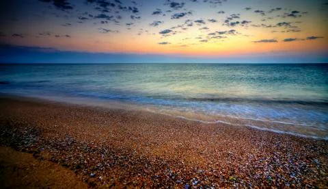 Sunrise over the beach Stock Photos