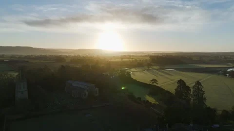 Sunrise over Berkeley Castle from a drone, Berkeley, Cotswolds, Gloucestershire Stock-Footage 302310758