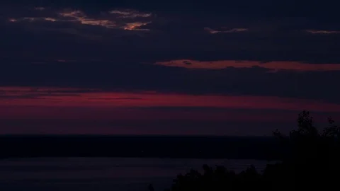 Sunrise over the big river. Video stock 79832658