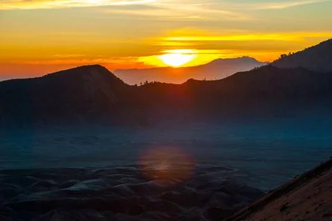 Sunrise over Bromo mountain, Java, Indonesia Colorful sunrise over Bromo v... Stock-Fotos