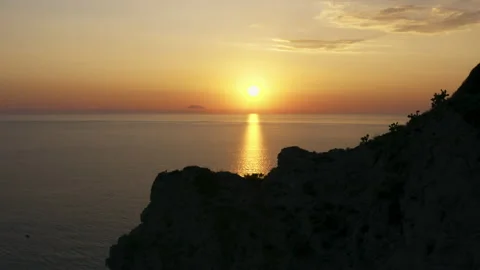 Sunrise over the calm ocean Stock Footage 204031726