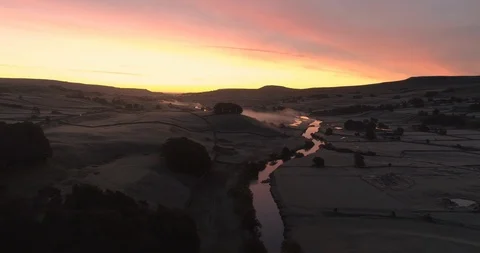 Sunrise over a calm river Video stock 119840778