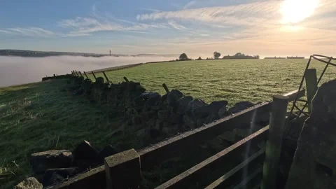 Sunrise over cloud inversion 2 Stock Footage 284772559