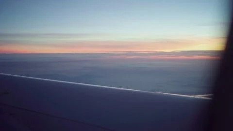 Sunrise over clouded hills seen from plane Stock-Footage 82177635