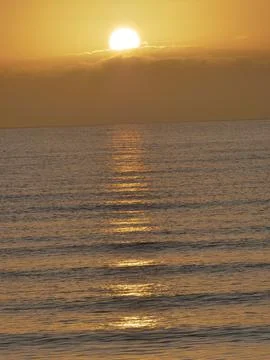 Sunrise over clouds Stock Photos