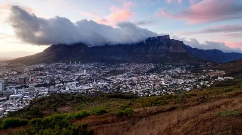 Sunrise over a cloudy Table Mountain Stock Photos