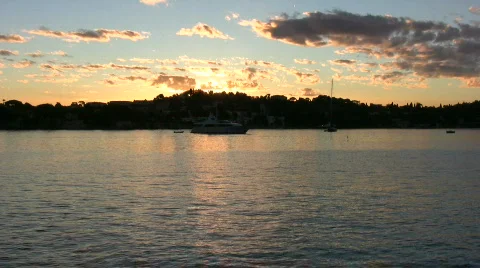 Sunrise over coastline Stock Footage 89607