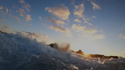 Sunrise over crushing waves Stock Footage 148514041