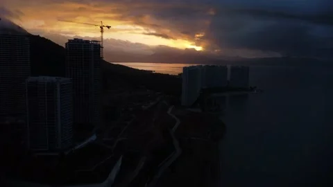 Sunrise over developing beachfront real estate Stockbeeldmateriaal 218413722