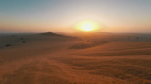 Sunrise over dunes in the Arabian desert timelapse Stock Footage