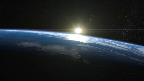 Sunrise over the Earth. The camera rotates to the right. The earth slowly Stock Footage 74170490