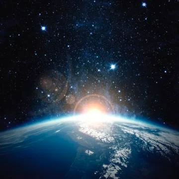 Sunrise over the Earth. Elements of this image furnished by NASA Stock Photos