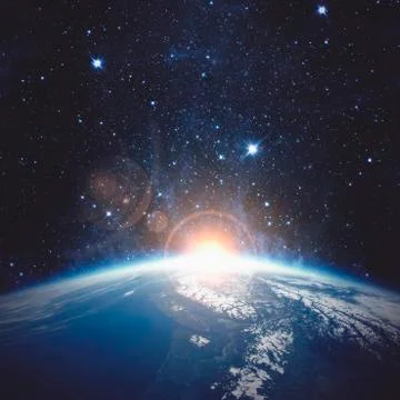 Sunrise over the Earth. Elements of this image furnished by NASA Fotos Stock