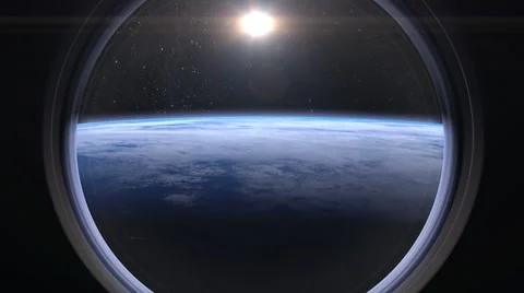 Sunrise over the Earth through window of International Space Station, moving to Stock Footage 68949690