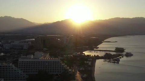 Sunrise over Eilat and The Red Sea, with waterfront hotels, Aerial view. Stock Footage 140761623