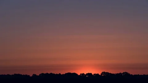 Sunrise over the forest on the horizon. Stock-Footage 76400728