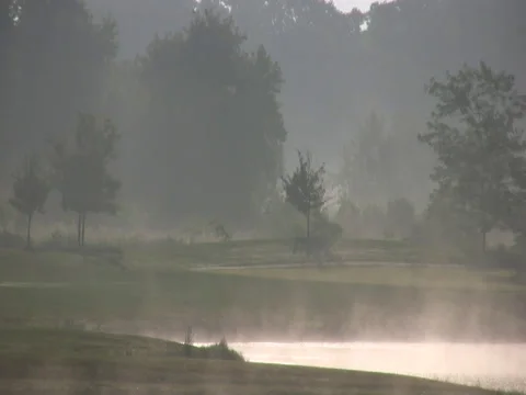 Sunrise over golf course pond Stock Footage 34569563