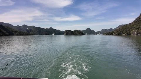 Sunrise Over Ha Long Bay, Vietnam – Limestone Karsts and Calm Sea Stock Photos
