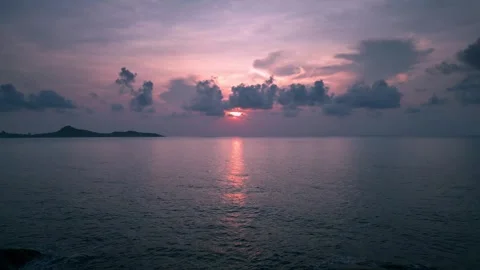 A sunrise over the horizon Stock Footage 284280503