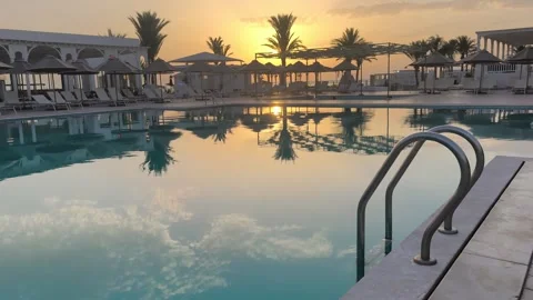 Sunrise Over a Hotel Pool in Djerba, Tunisia Stock-Footage 342786549