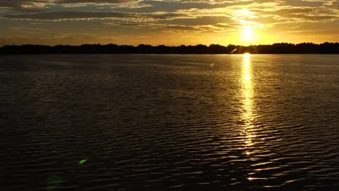 Sunrise over lake Stock Footage 75244030
