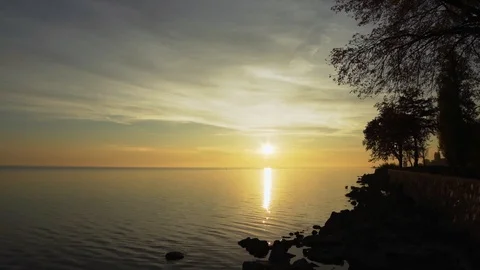 Sunrise over a lake Stock Footage 93782835