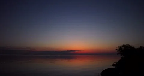 Sunrise over lake Stock Footage 132078725