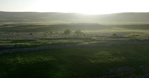 Sunrise over limestone pavement Stock Footage 277435056