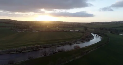 Sunrise over the meandering river Stock Footage 108875797
