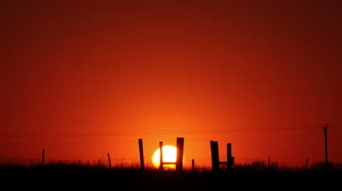 Sunrise over midwest field Stock Footage