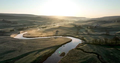 Sunrise over a misty river Stock Footage 205036571
