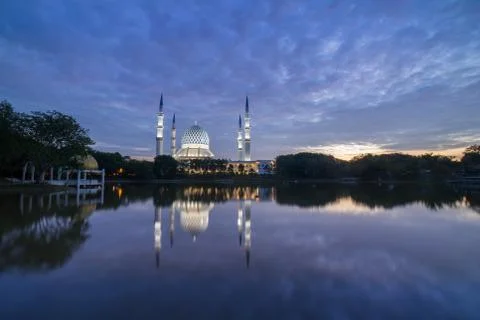 Sunrise over the mosque. Stock Photos